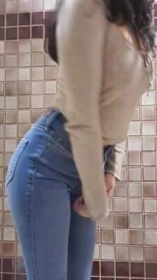 Showing Off Her Ass In Tight Denim Jeans on freefilmz.com