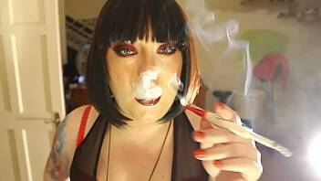 Fat Domme Tina Smua Smokes A Filterless Cigarette In A Holder - Britain on freefilmz.com