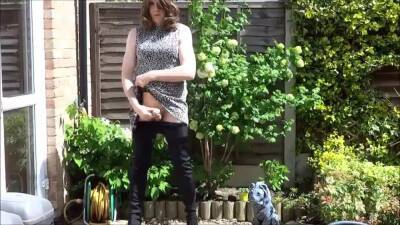 Sexy masturbating crossdresser in thigh boots outdoors on freefilmz.com