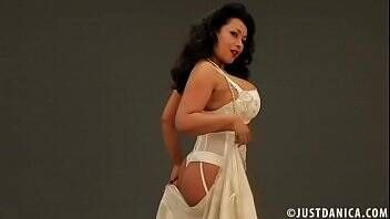 Danica Collins (Donna Ambrose) in silk lingerie striptease - Britain on freefilmz.com