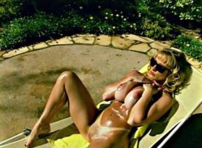 Blonde with perfect tits, ass and tan lines by the pool - Usa on freefilmz.com