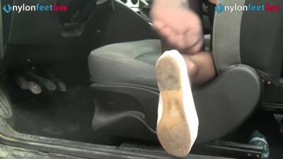 Redhead shows off panties and stockings in car and drives on freefilmz.com