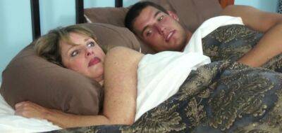 Sweet blonde mommy was awoken for quick sex by her randy stepson on freefilmz.com