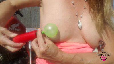 Nippleringlover Horny Milf Sticking Balloons Through Extreme Stretched Pierced Nipples Outdoors on freefilmz.com