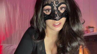 Busty JOI from a sexy brunette in a mask on freefilmz.com