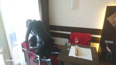 In Latex Covered Couple Enjoys A Good Drink on freefilmz.com