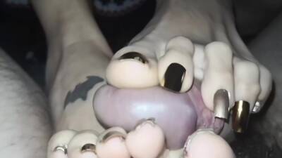 Woman With Inked Feet And Black Toe Nails Gives A Pov Toejob on freefilmz.com