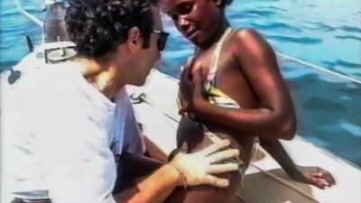 Black Bikini Babe Public Interracial Banging On A Boat And Beach on freefilmz.com