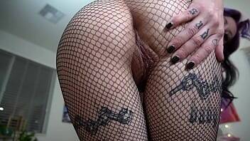 Tatted Slut Shows Off Tight Asshole In Fishnets on freefilmz.com