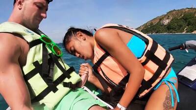 Thai teen giving blowjob on a jet ski - Thailand on freefilmz.com