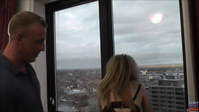 Classy Filth fucked in front of the window for all the city to see on freefilmz.com