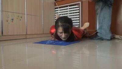 Sluty Asian girl enjoys BDSM and whipping on a floor on freefilmz.com