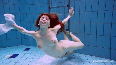 Redhead Marketa In A White Dress In The Pool - Russia on freefilmz.com