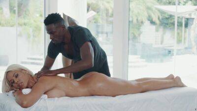 African masseur fucks his big tits bimbo client on the table on freefilmz.com