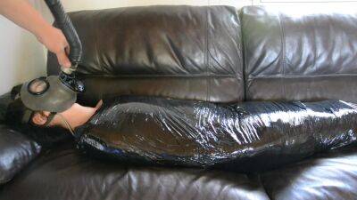 Plastic Mummification Girl With Gasmask on freefilmz.com