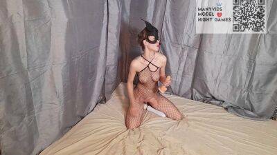 Girl In A Mask And A Mesh On The Body Sucks And Fucks A Dildo on freefilmz.com