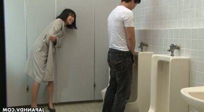 Crazy Asian chick Uta Kohaku pisses on dick of one stranger dude in a public toilet on freefilmz.com