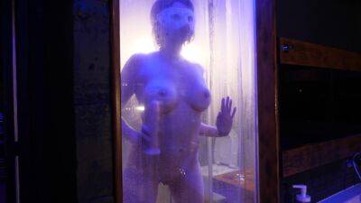 Juicy Brunette In The Shower With A Glass Wall Puts A Dildo In All Holes on freefilmz.com