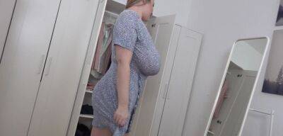 BBW blonde reveals her giant jugs while undressing on freefilmz.com