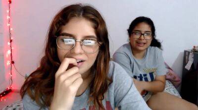 Two nerdy latinas playing with their pussies on cam on freefilmz.com