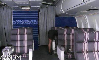 Sexy stewardess in pantyhose seduced by a pilot in airplane on freefilmz.com