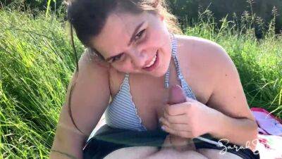 Outdoor Blowjob in the meadow while people walk by in public - cum in her mouth - Sarah Sota on freefilmz.com