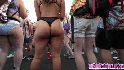 Phat ass Latina raver girl shaking her big ass cheeks at rave festival on freefilmz.com