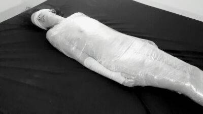 Mummified in plastic wrap girl gets fucked and squirts after fingering on freefilmz.com