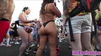 Phat ass Latina raver girl shaking her big ass cheeks at rave festival on freefilmz.com