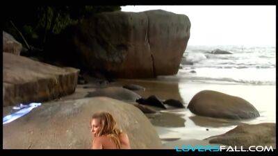 Stripteasing beach blonde anal babe on freefilmz.com