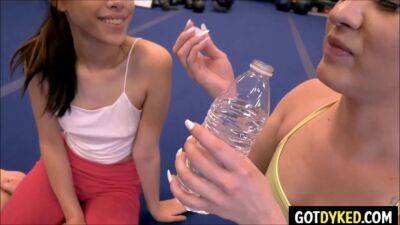 Petite yoga babe with small tits enjoys intense lesbian sex in a gym session on freefilmz.com