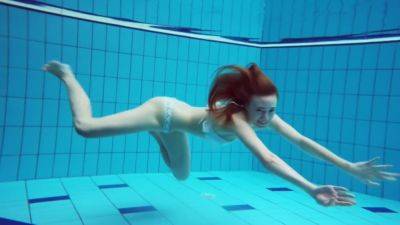Dianas Redhead Beauty Enhances Her Swimming Grace on freefilmz.com