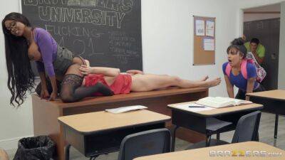 Bosomed black teacher with glasses gets eaten out and screwed in the classroom on freefilmz.com