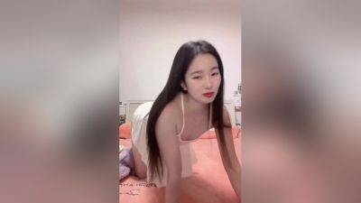 Cute asian teen girl playing alone - China on freefilmz.com