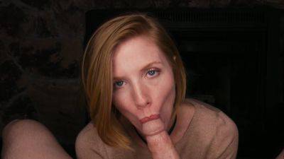 Freckled redhead throats the big dick and lets it explode on her face on freefilmz.com