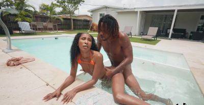Aroused ebony goes very loud during outdoor pool porno with her new BF on freefilmz.com