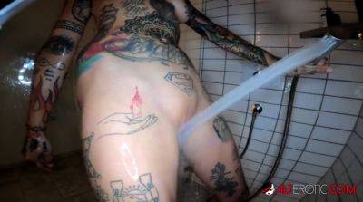 Lucy ZZZ gets her inked body pounded hard in the shower on freefilmz.com