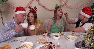 Sweet babes swap partners on Christmas eve in loud foursome on freefilmz.com