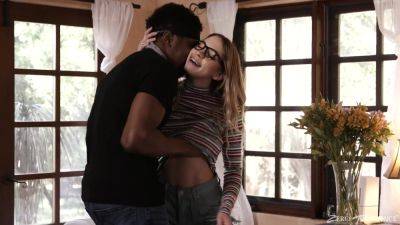Nerdy young blonde shares passionate moments fucking a black lover on freefilmz.com