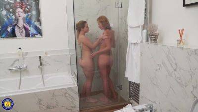 Mature star Effie Gold enjoys a steamy lesbian shower with Karry on freefilmz.com