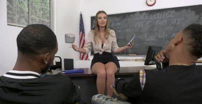 Appealing MILF teacher gets busy with two black studs on freefilmz.com