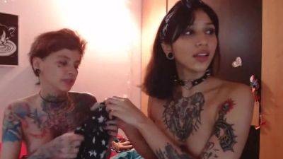Two girls with tattoos show what they can do with hot pussy on freefilmz.com