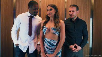 Elegant chick fucked in the elevator by two horny studs on freefilmz.com