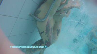 In This Underwater Video We See A Lot Of Piercings And Tattoos on freefilmz.com