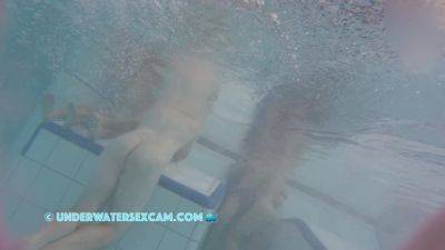 This Young Couple Plays Together Underwater In Front Of Many People on freefilmz.com