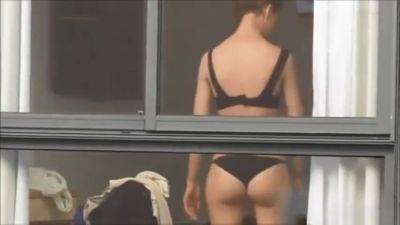 Spying on neighbour undressing. on freefilmz.com