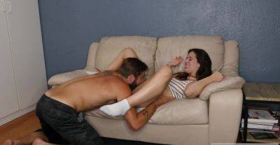 Cute brunette shares moments of lustful passion on the couch on freefilmz.com